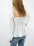 white smocked top from back