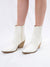 white store western style bootie on model