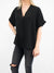 oversized v neck top from front in black