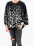 black and white spotted sweater from front