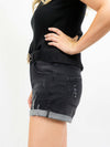 Black denim shorts from side