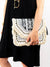 black and white large boho beaded clutch being held