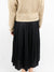 black pleated midi skirt from back