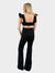denim ruffle jumpsuit in black with back cutouts