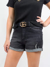 black ribbed top with black jean shorts