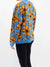 blue sweater with orange flowers from back on model