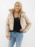 taupe vegan leather puffer on model