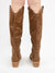 knee high leather boots in brown from back