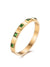 emerald and gold baguette bracelet