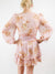 floral ruffle and smocked dress from back