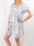 floral patterned mini dress with ruffle detail on sleeves from front