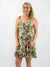 tropical print wrap dress on model from front