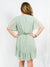 mint green print ruffle dress from back