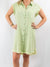 Vintage wash high low denim dress with a raw hemline in green.