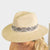 Raffia fedora hat on model