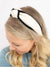 black and white leather headband on