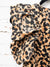 closeup of fabric of leopard dress