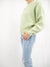 pistachio green sweater from side