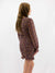 floral ruched dress on model from back