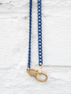 close up of pave clasp navy choker necklace