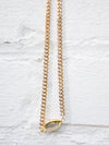 gold dippd pearl on gold chain necklace hanging