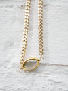 close up of gold dipped pearl on gold chain choker necklace