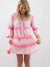 pink tie dye dress on model from front twirled