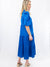 blue tiered midi dress on model from side
