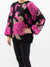 floral sweater in black and pink on model