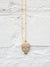 gold necklace with pave skull pendant