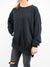 stay wild pullover in black from front with plain design
