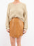 khaki cropped sweater with suede skirt