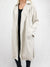 cream trench coat from front