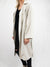 cream trench coat from side