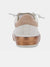 Tan, white, and gold fashion sneaker from back.